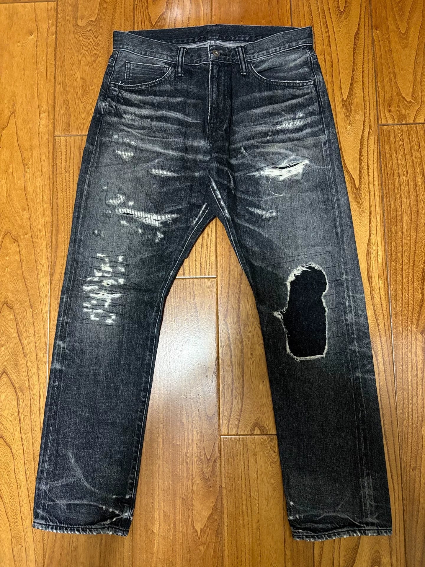 sequel fragment denim pants with distressing