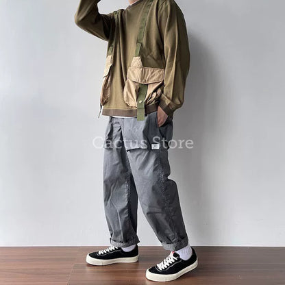 white mountaineering hunting pocket sweatshirt