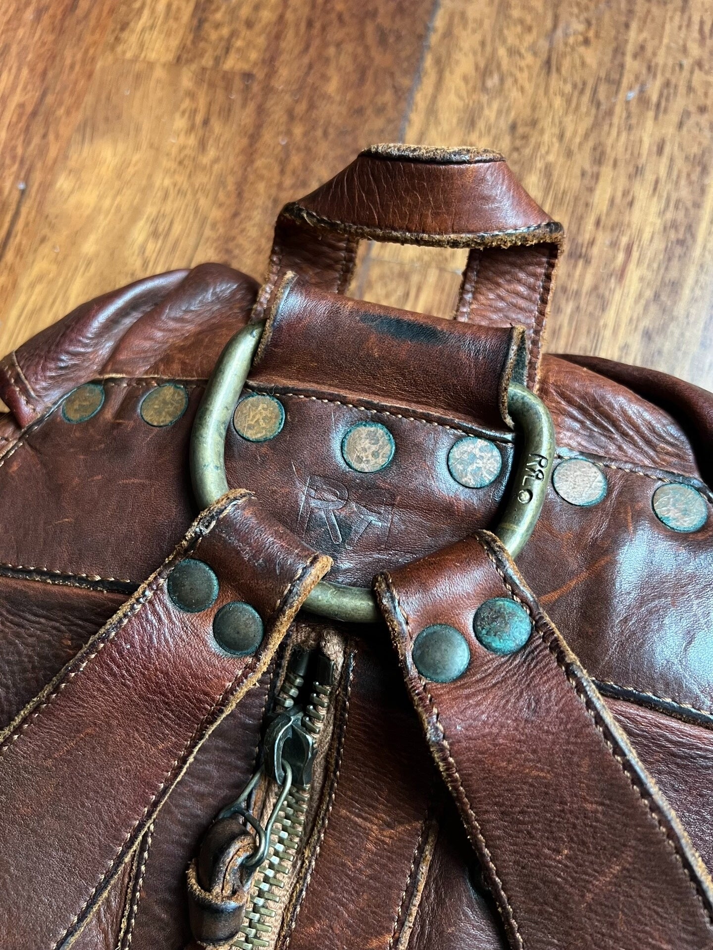 brown leather RRL backpack with pockets