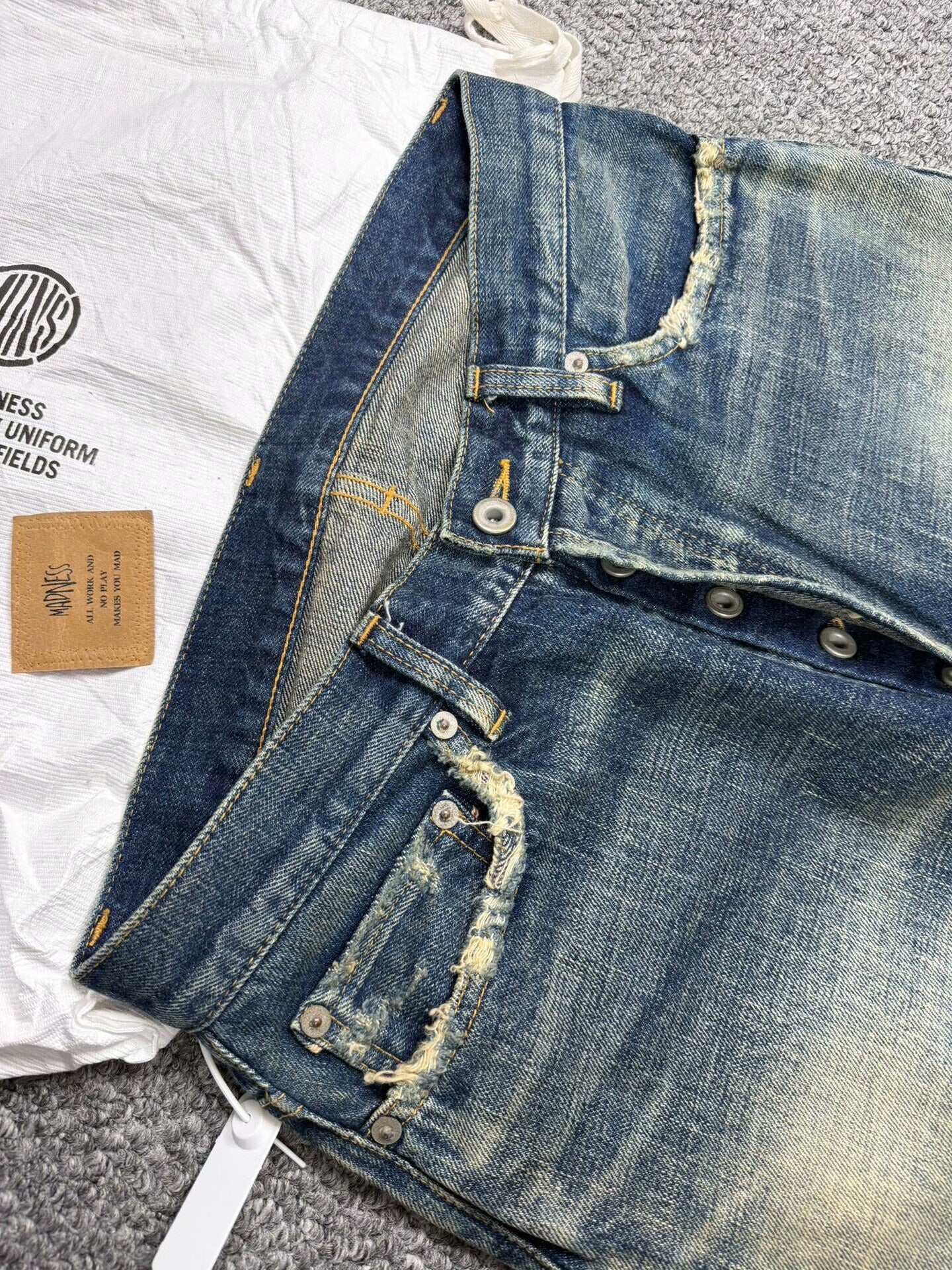 madness distressed denim pants for casual styling