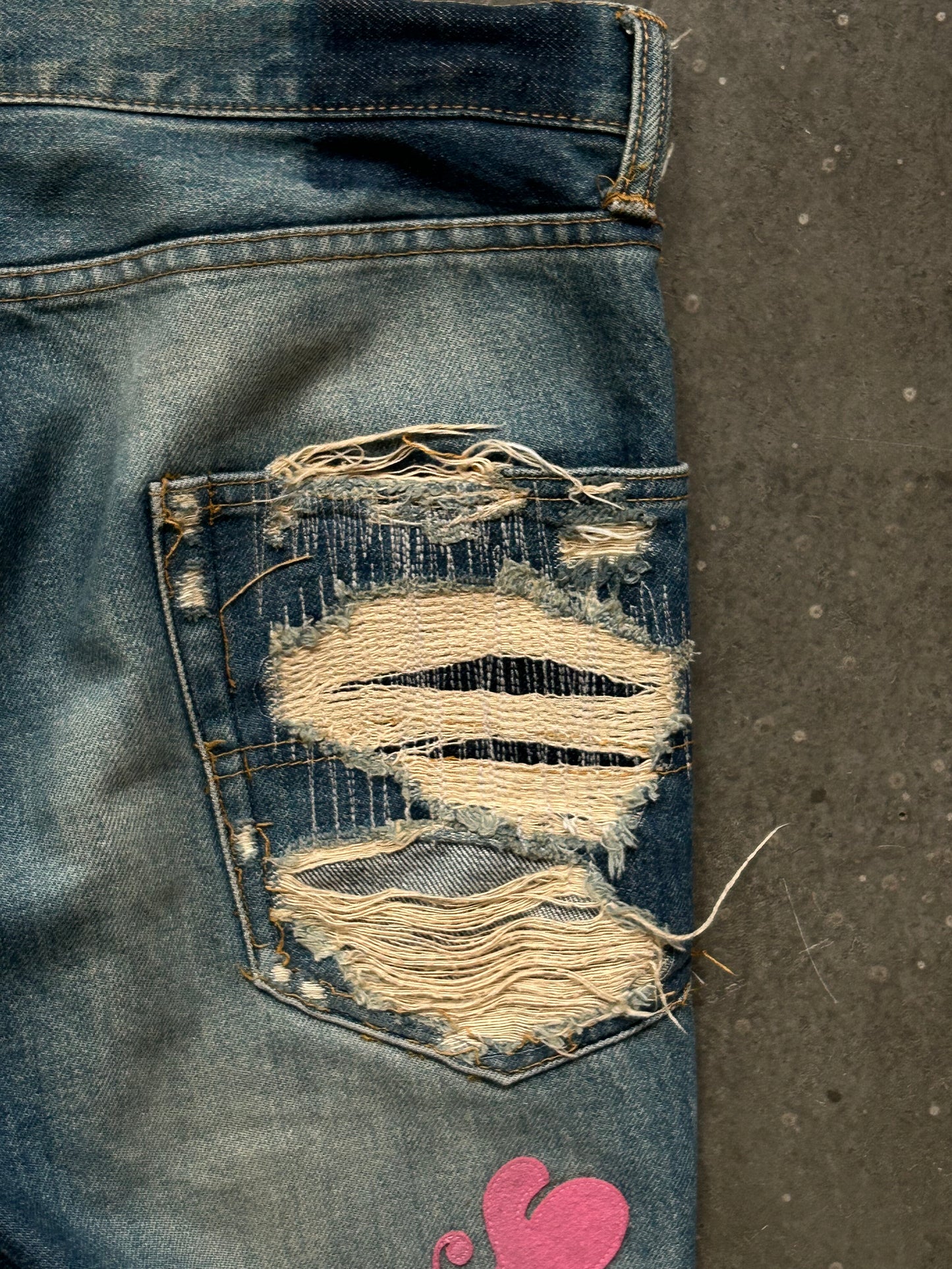 undercover love lightning denim pants