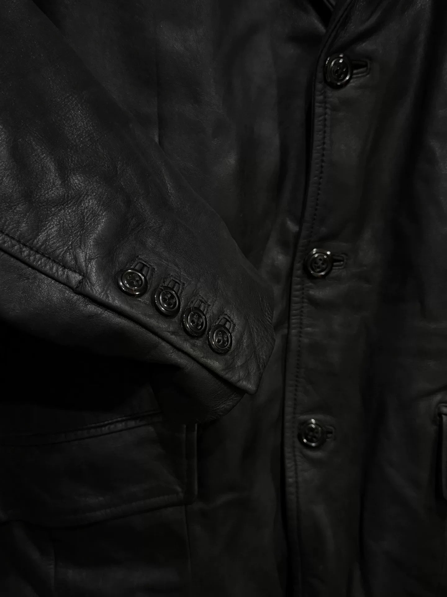 black leather suit coat with vampire style