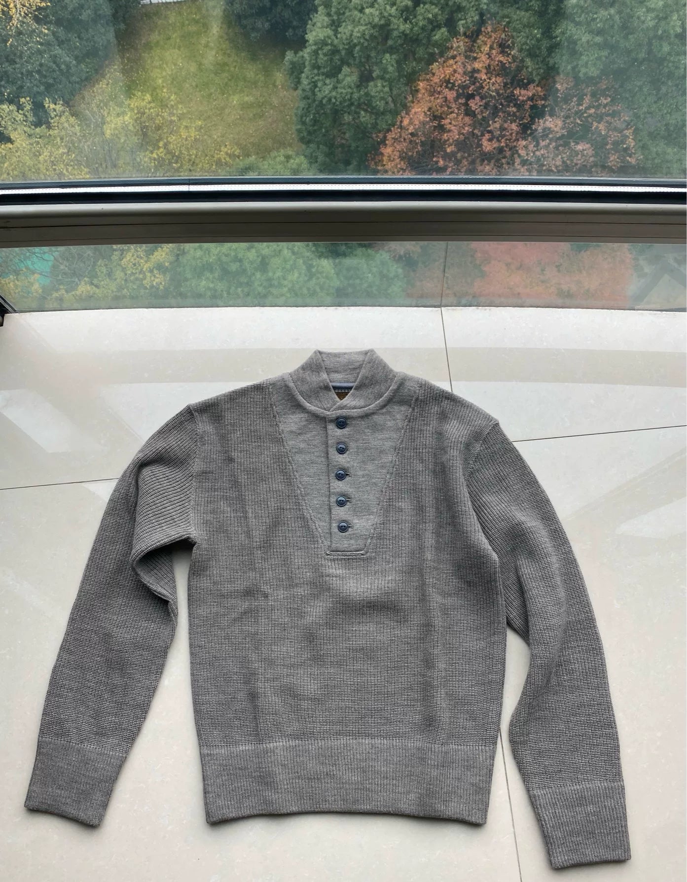 gray wool sweater with button details