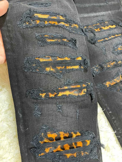 amiri leopard thrasher jean in size 34