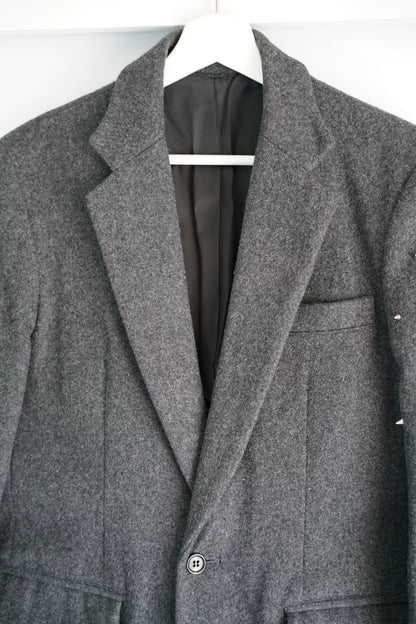 gray wool coat with studs by Sulvam