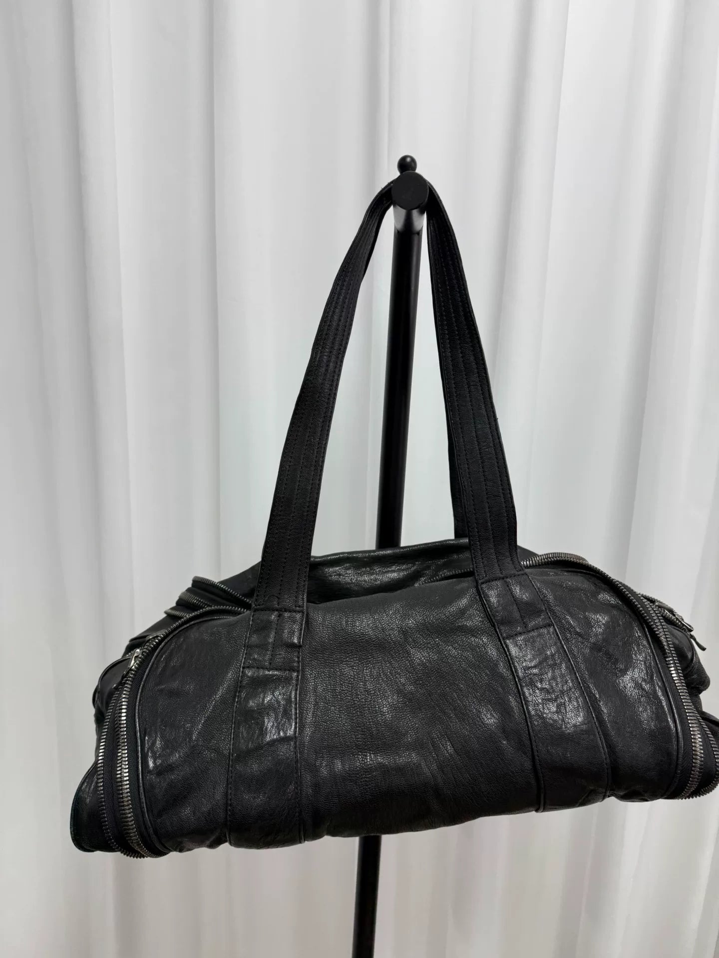 large black zippered handbag