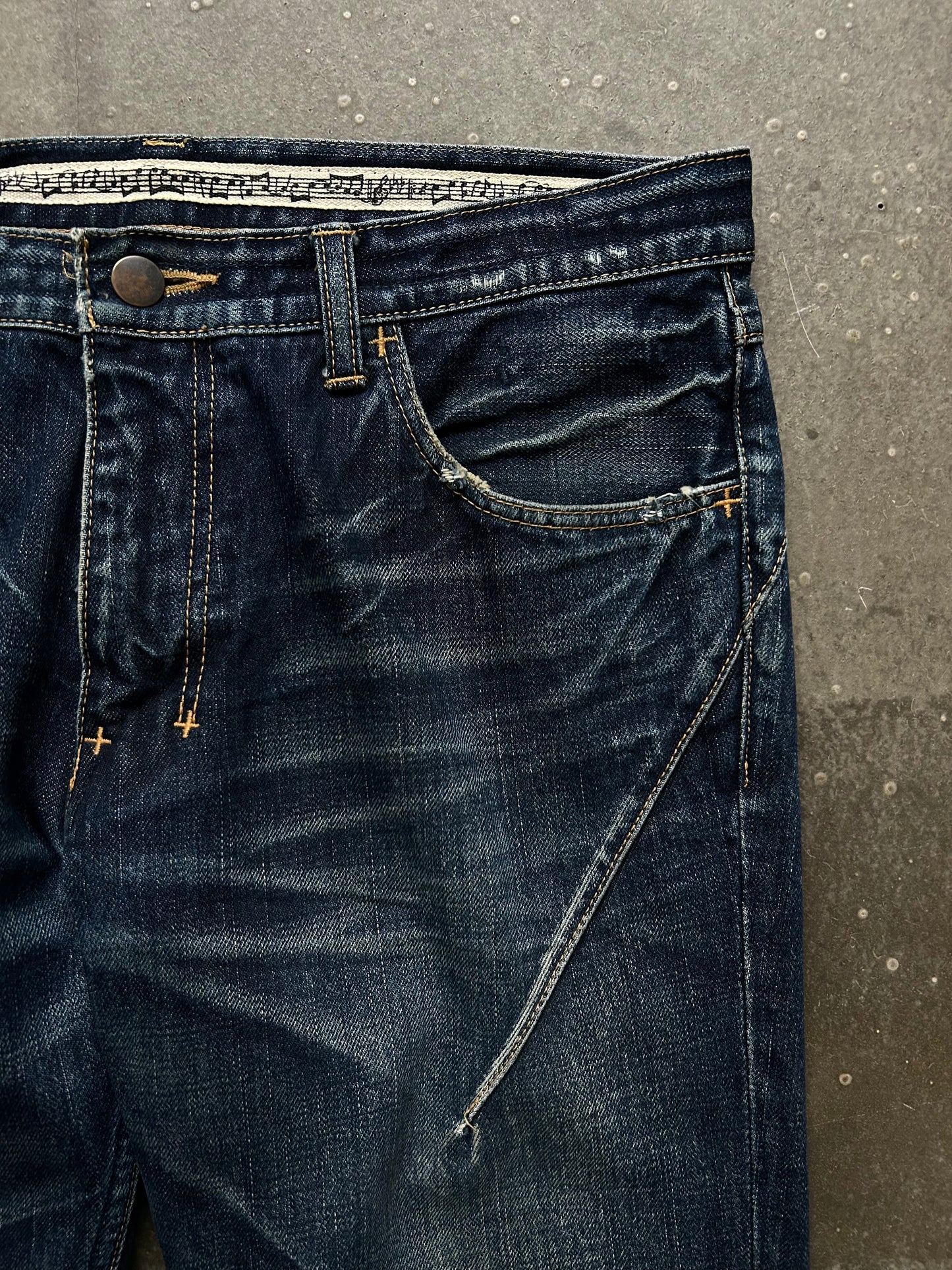 distressed washed denim pants by number nine