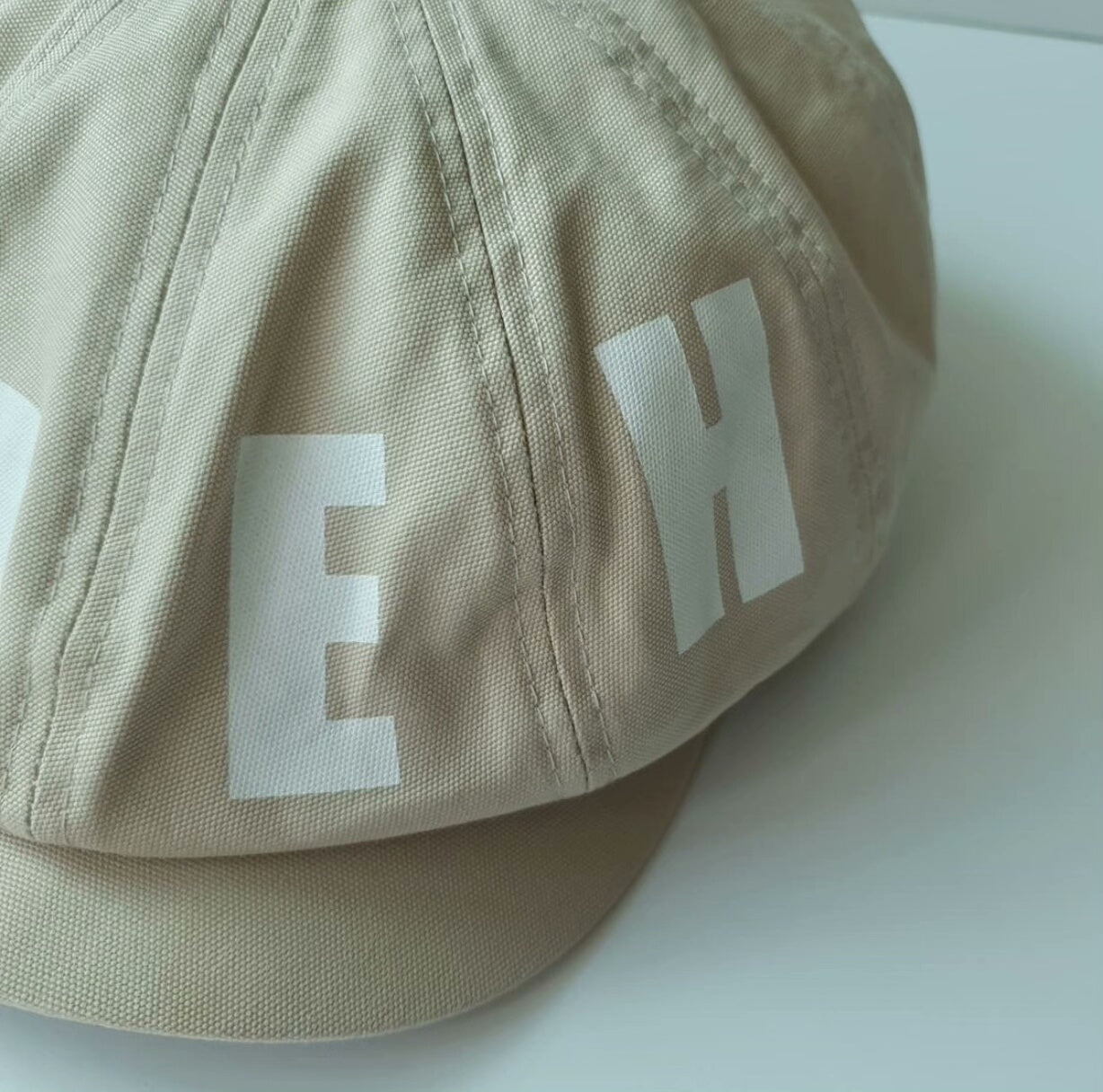 goodenough newsboy cap in ivory color