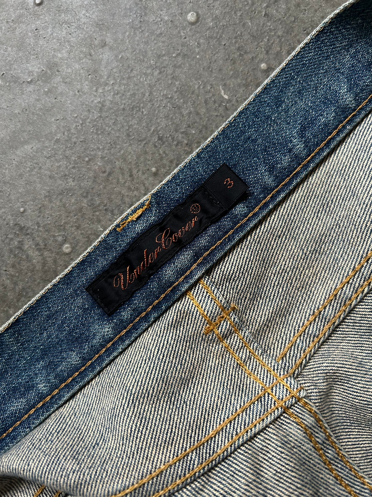 undercover love lightning denim pants