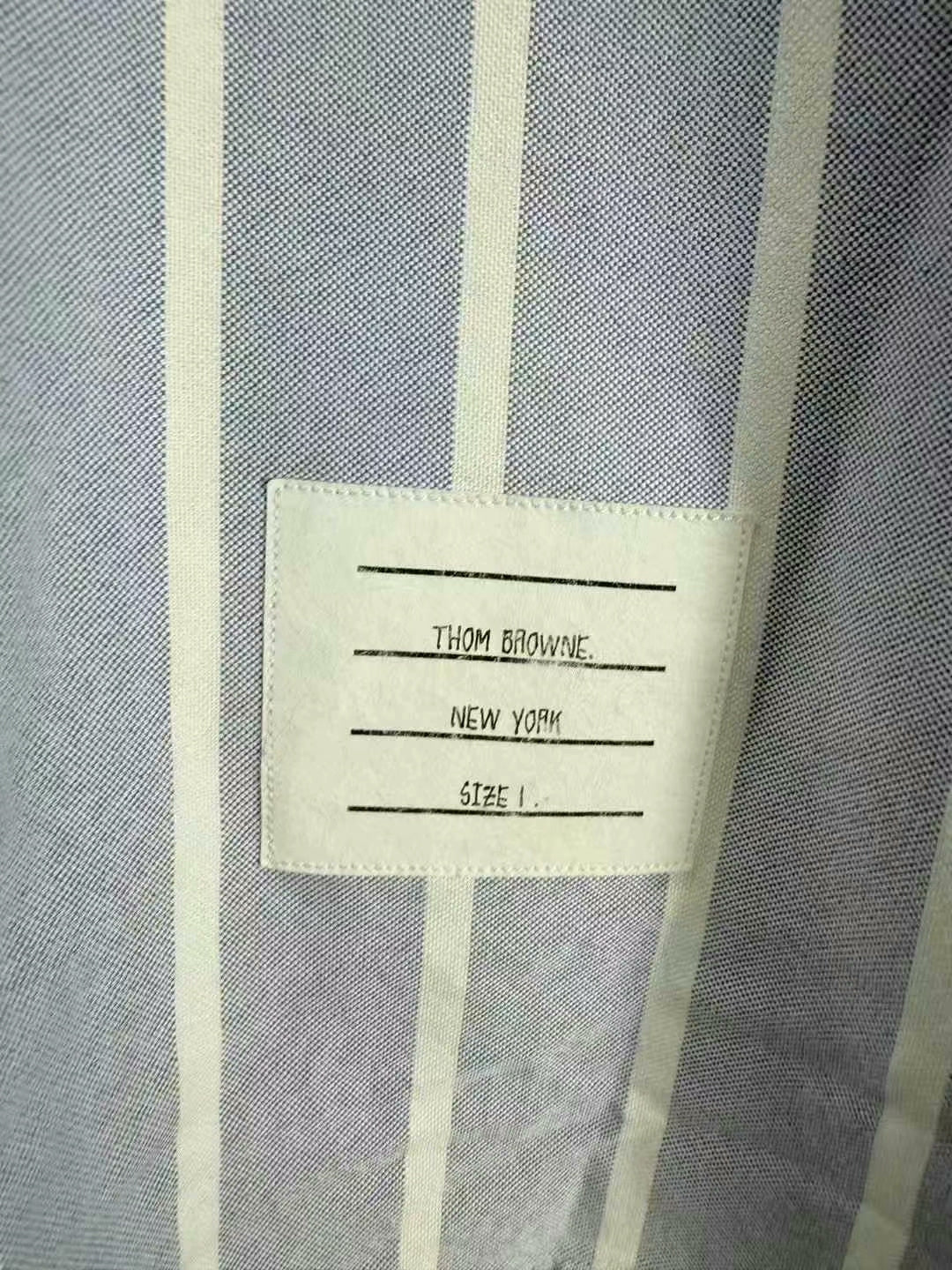 thom browne blue and white striped shirt