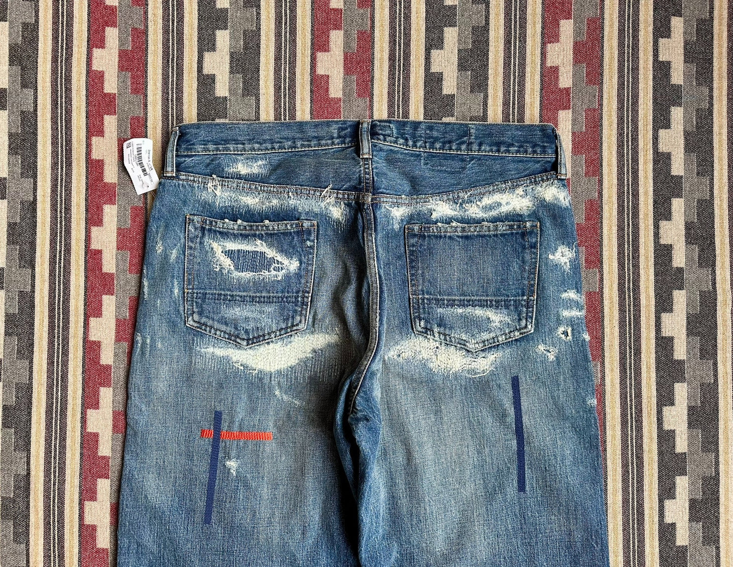 fdmtl classic fit red line distressed jeans