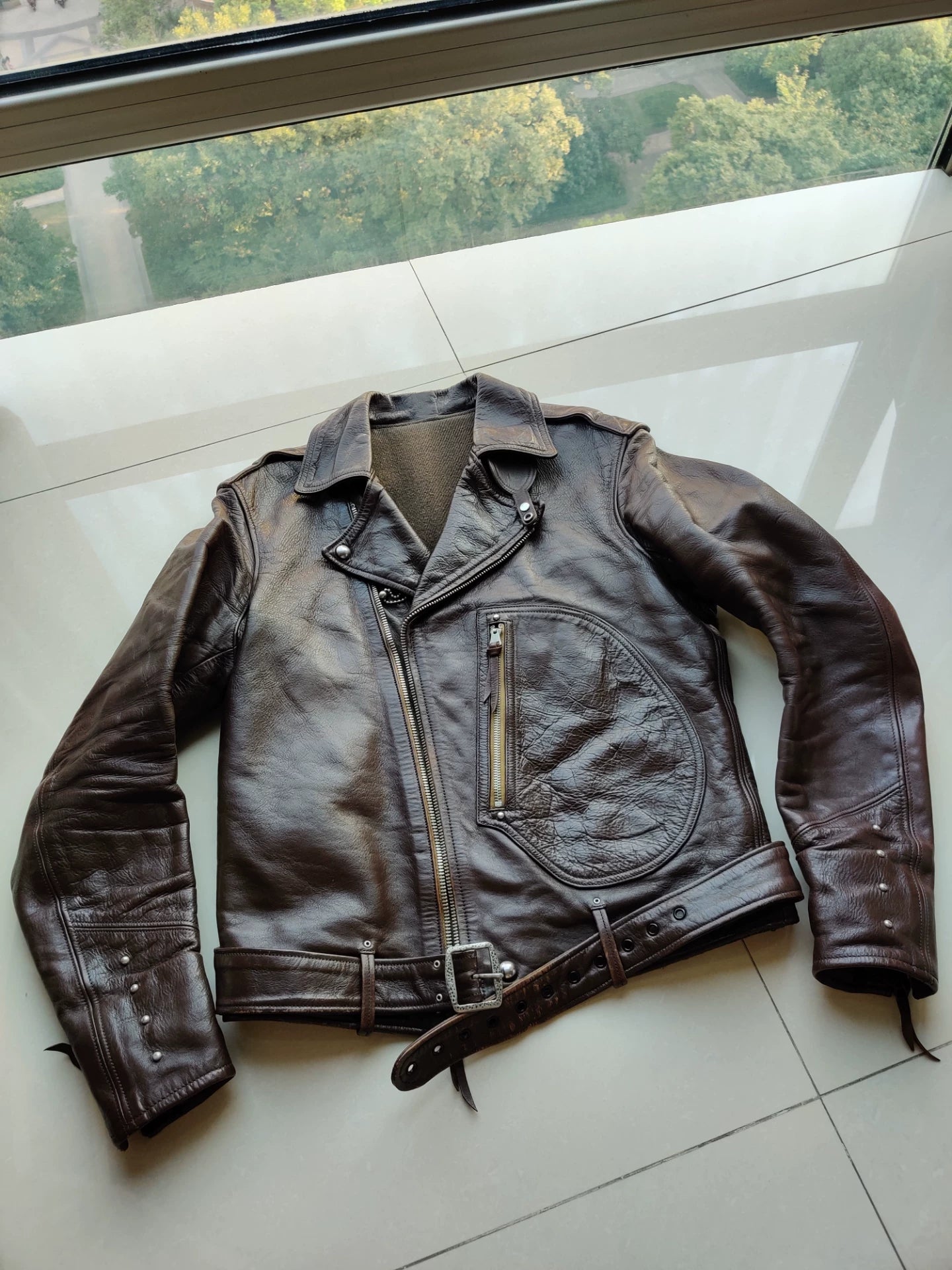 stylish brown leather biker jacket
