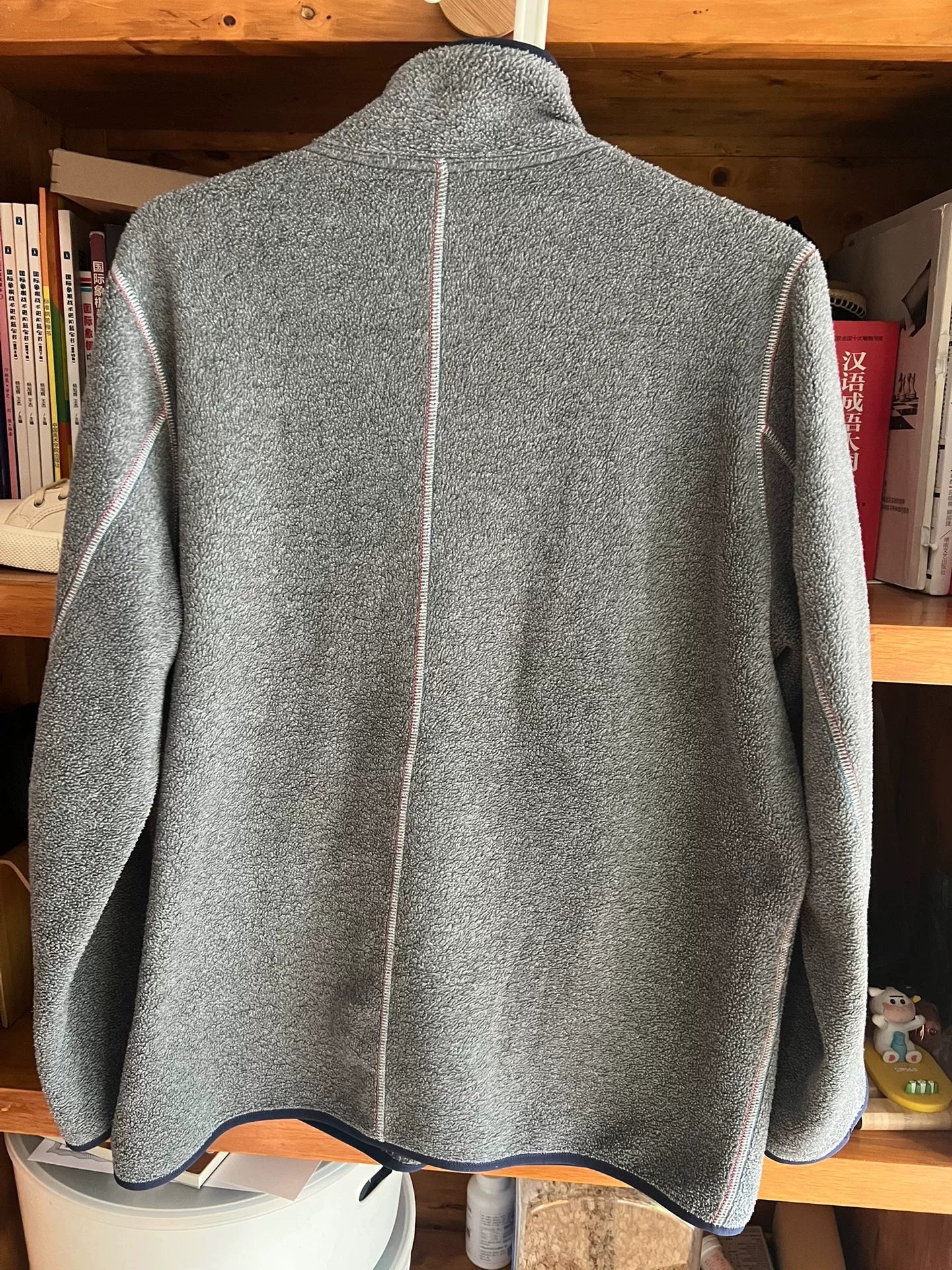 stylish gray fleece jacket with blue accents