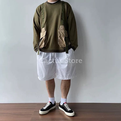 white mountaineering hunting pocket sweatshirt