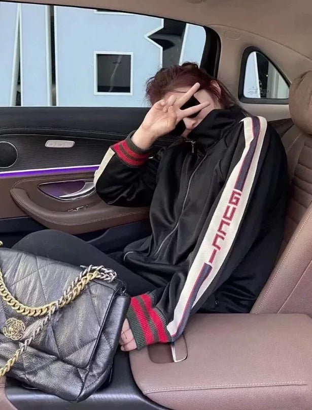 gucci black logo jacket with side stripes