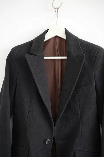 black tailored suit jacket by Sulvam