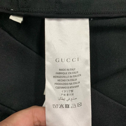 gucci black logo jacket with side stripes