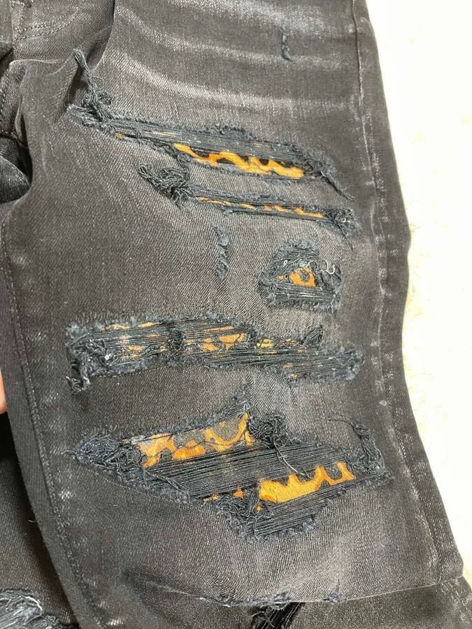 amiri leopard thrasher jean in size 34