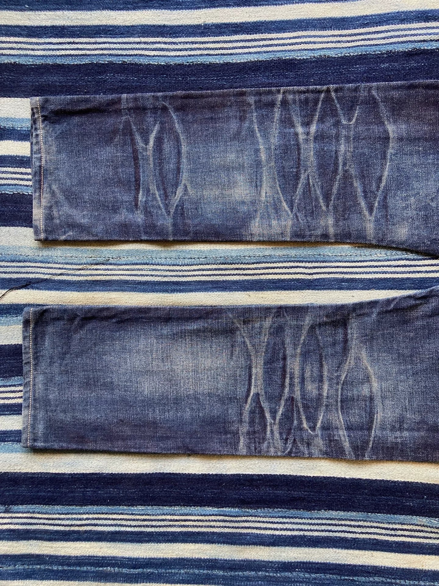 washed vintage-style raw denim jeans