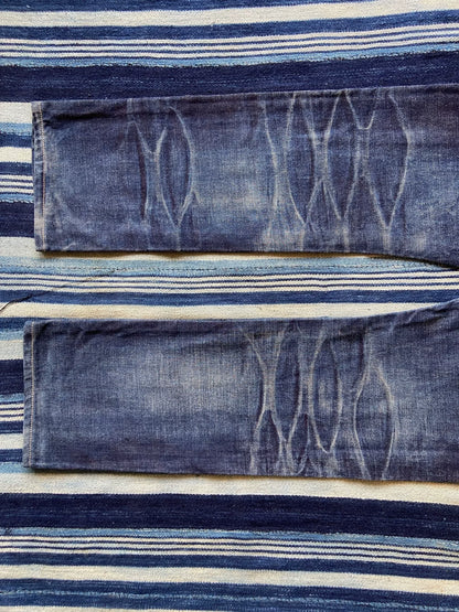 washed vintage-style raw denim jeans