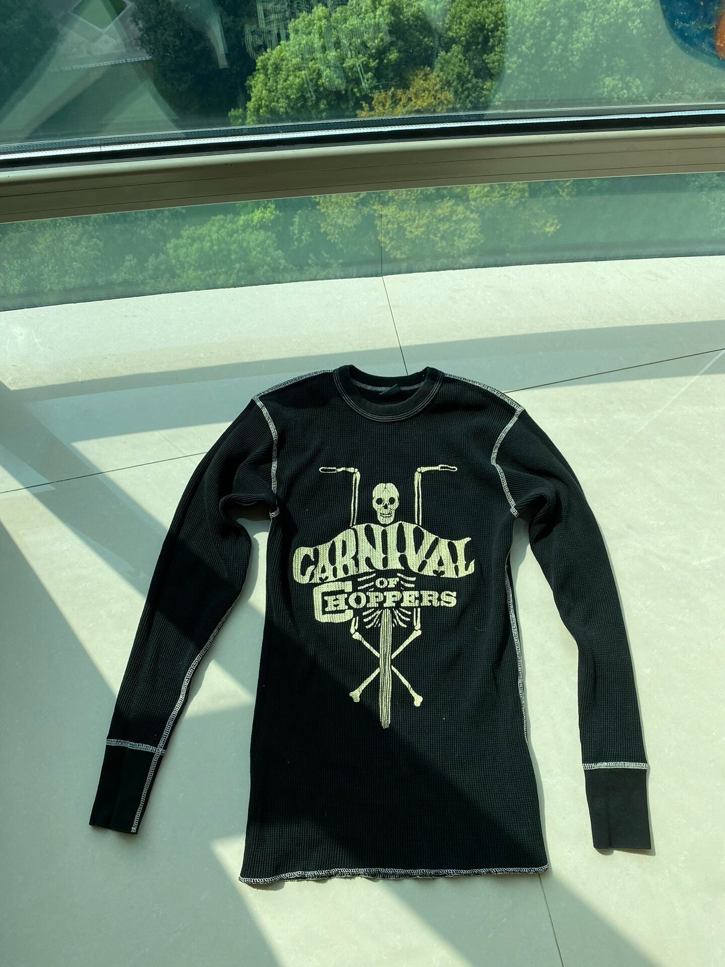 black long sleeve skeleton graphic shirt