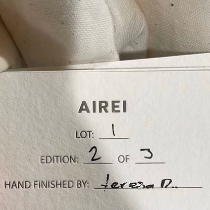 airei hand-stitched wool puffer vest