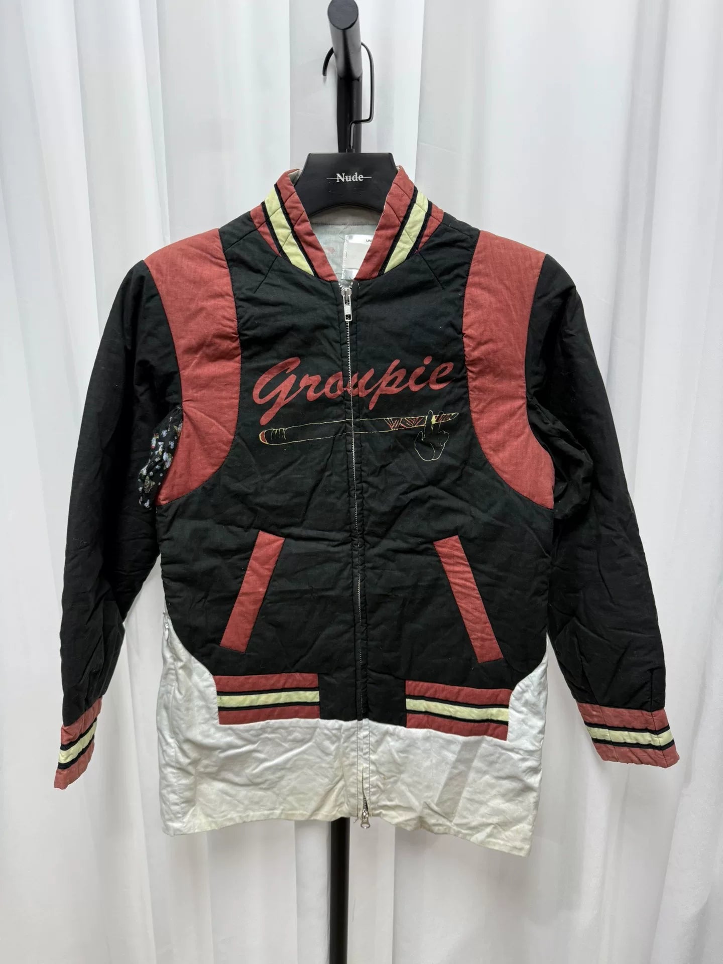 undercover bomber jacket with red accents