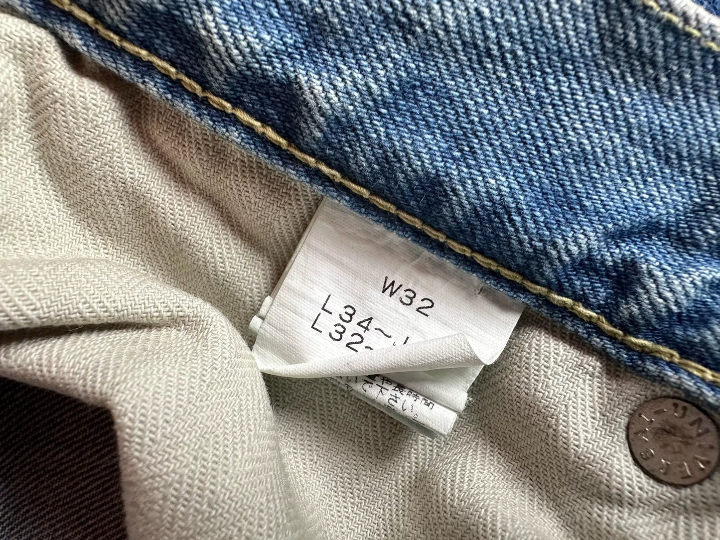 fdmtl slim fit denim distressed patchwork jeans