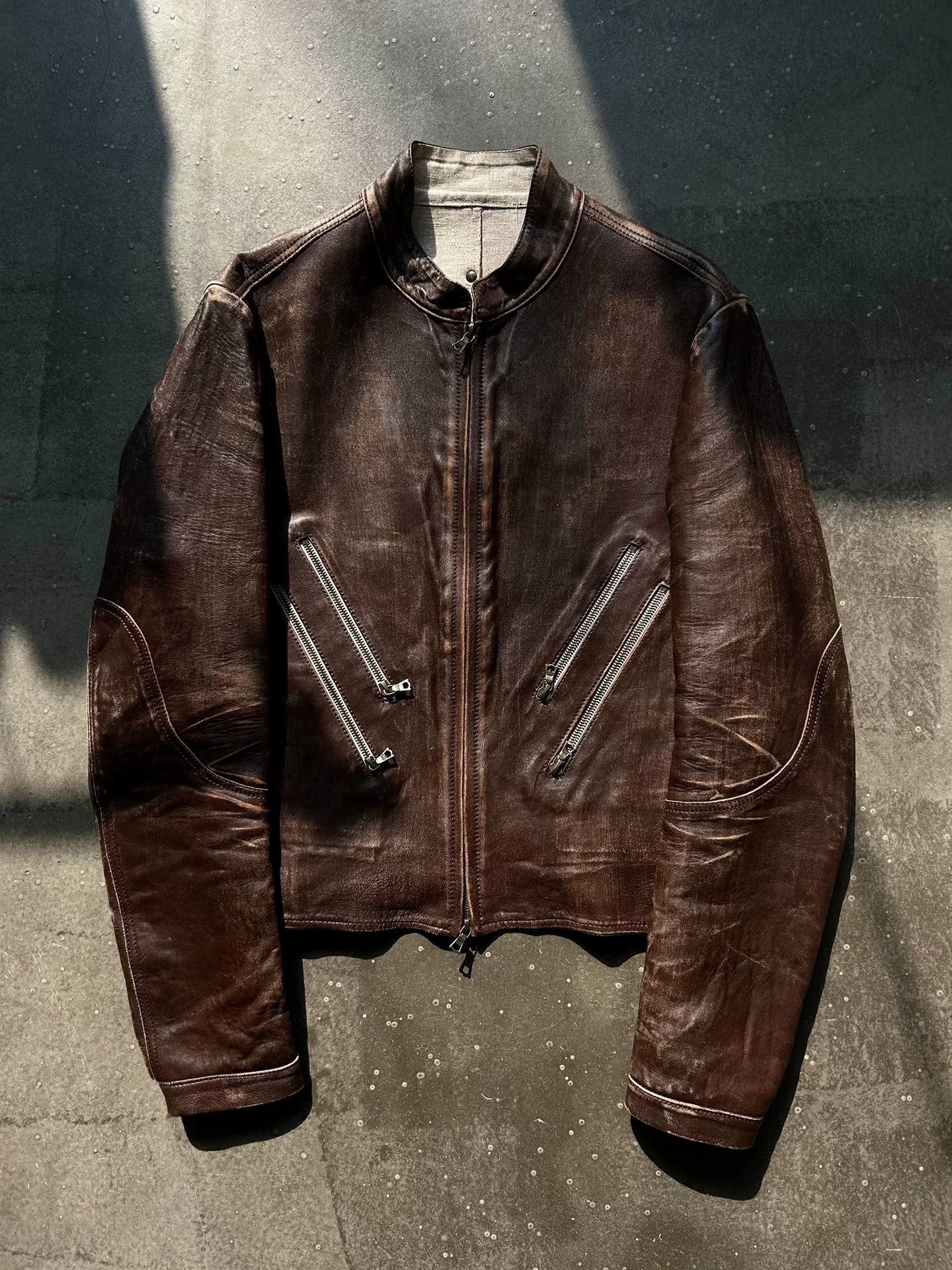 distressed leather jacket with four pockets