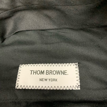 gray striped wool suit trousers by Thom Browne