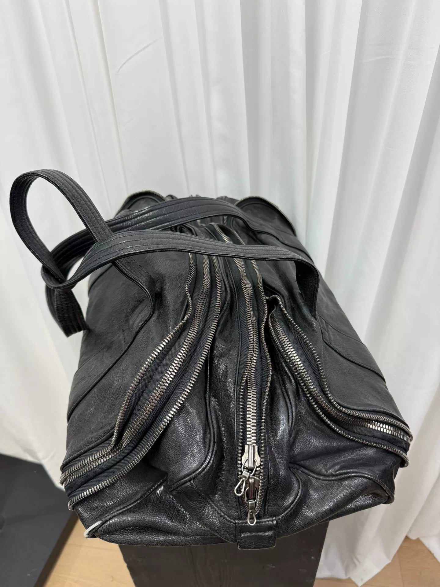 large black zippered handbag