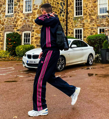 needles track jacket in black and pink