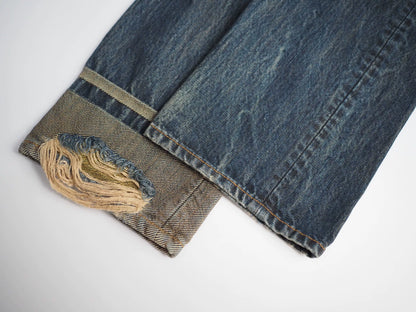 blue denim jeans with gold detail