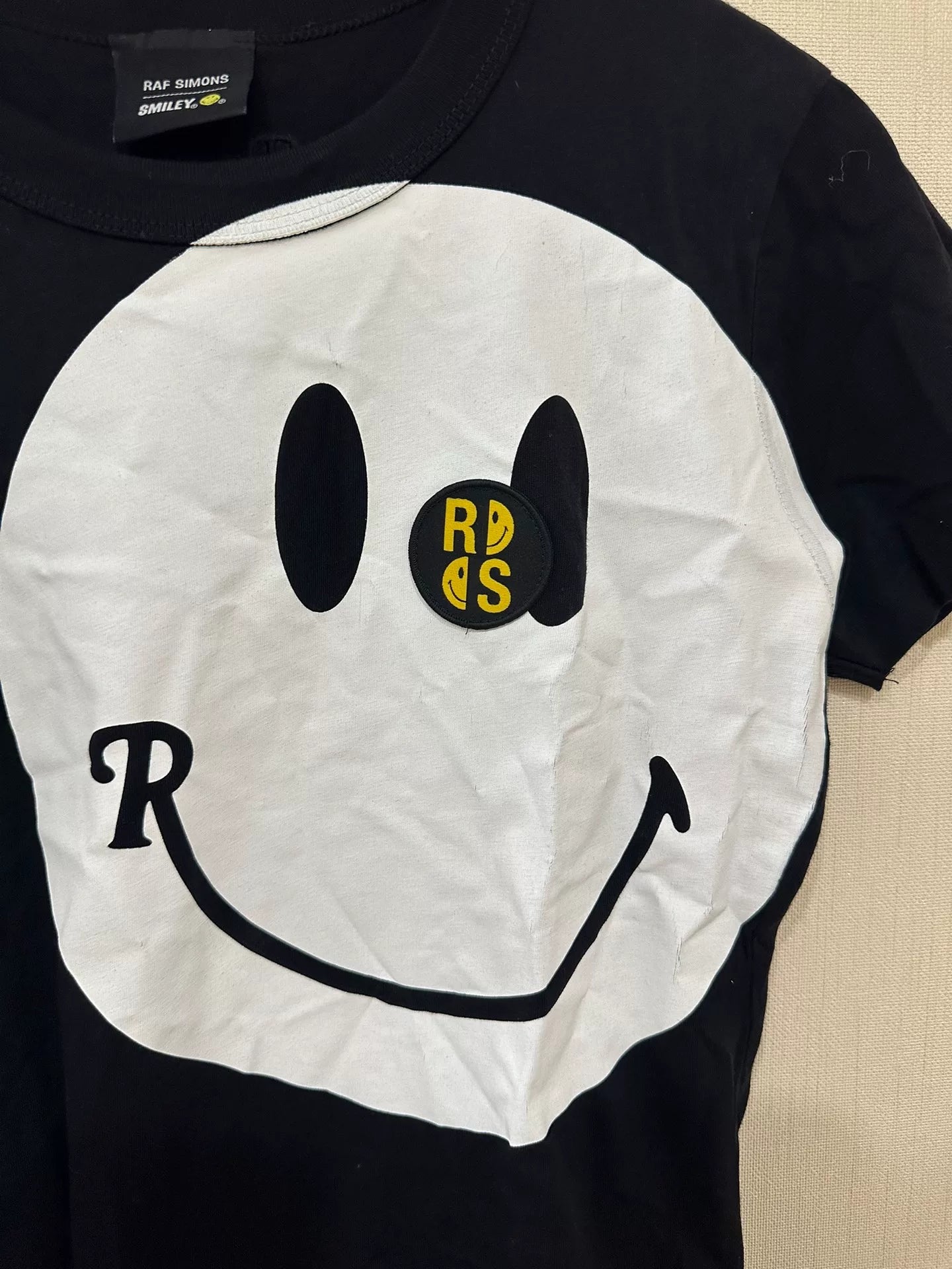 raf simons smiley face collaboration t-shirt