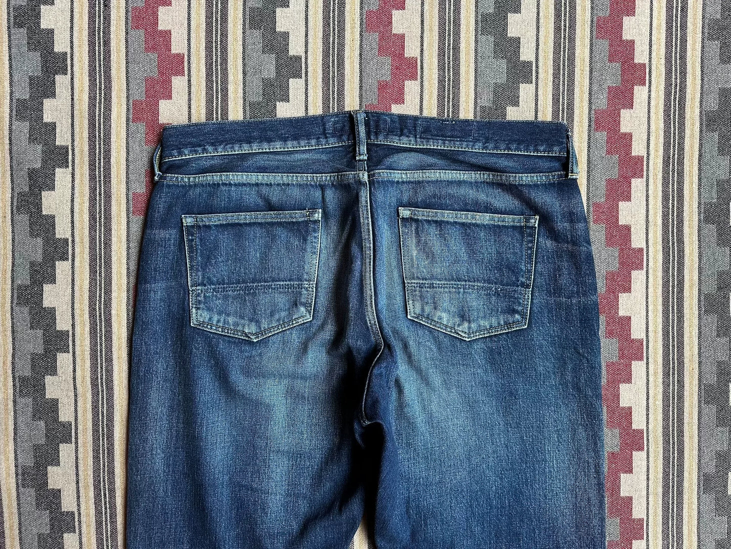 fdmtl slim fit denim with repair patches
