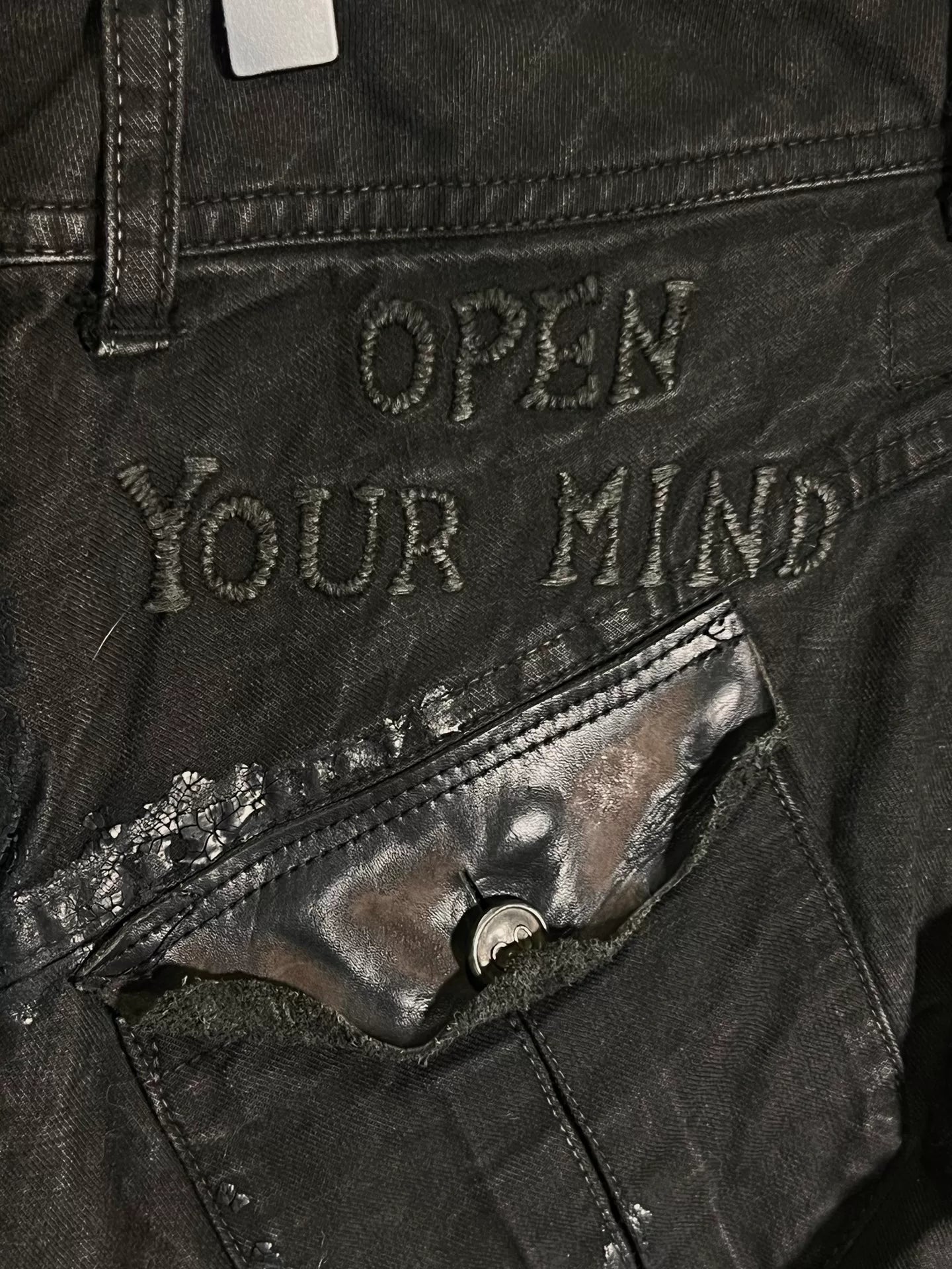 embroidered denim pants with patchwork details