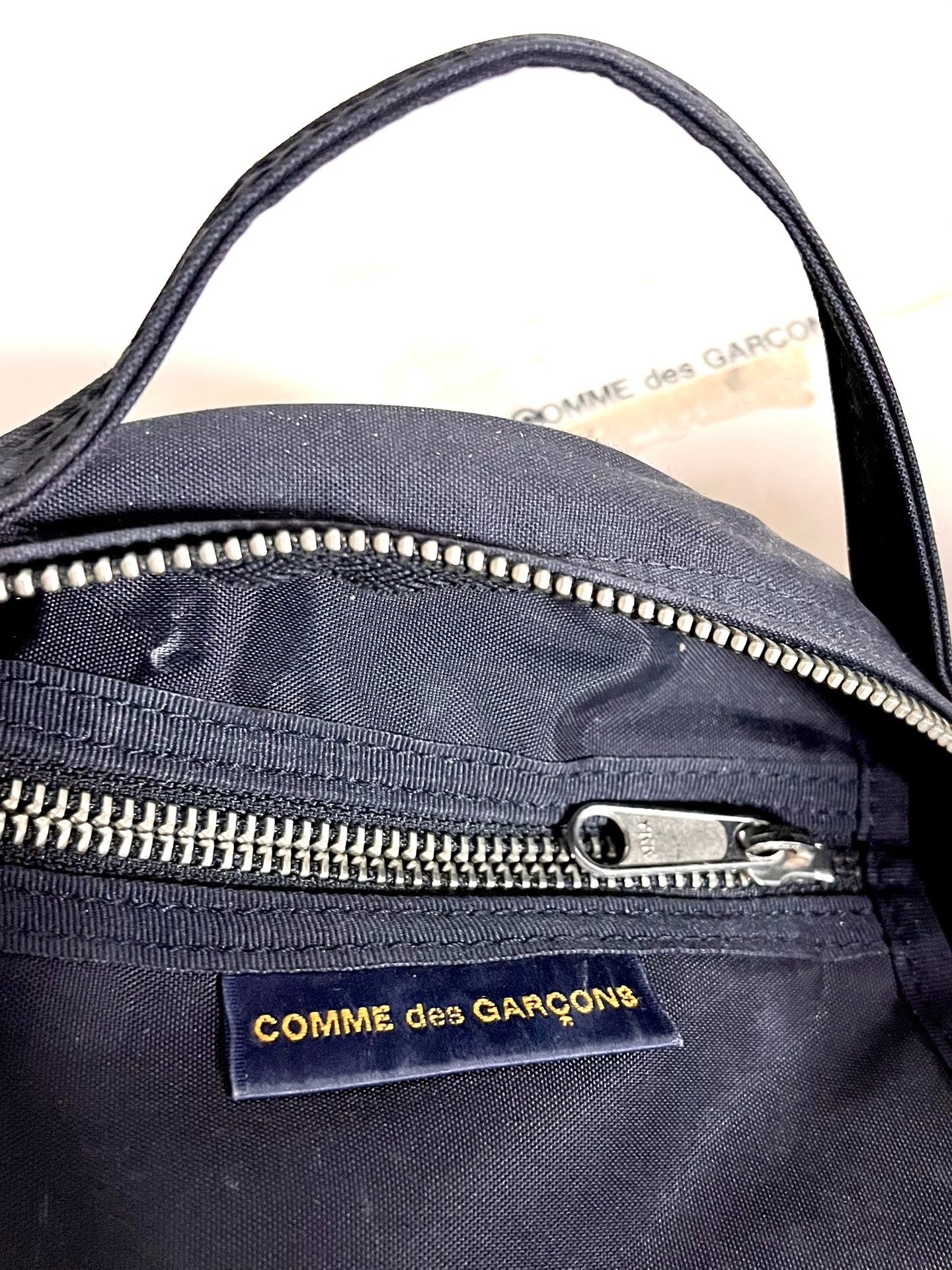 Comme des Garçons Tiny Bag Round