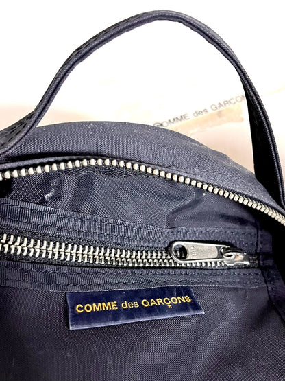 Comme des Garçons Tiny Bag Round