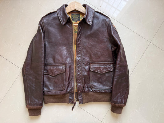 Vintage Brown Leather Jacket with Unique Details