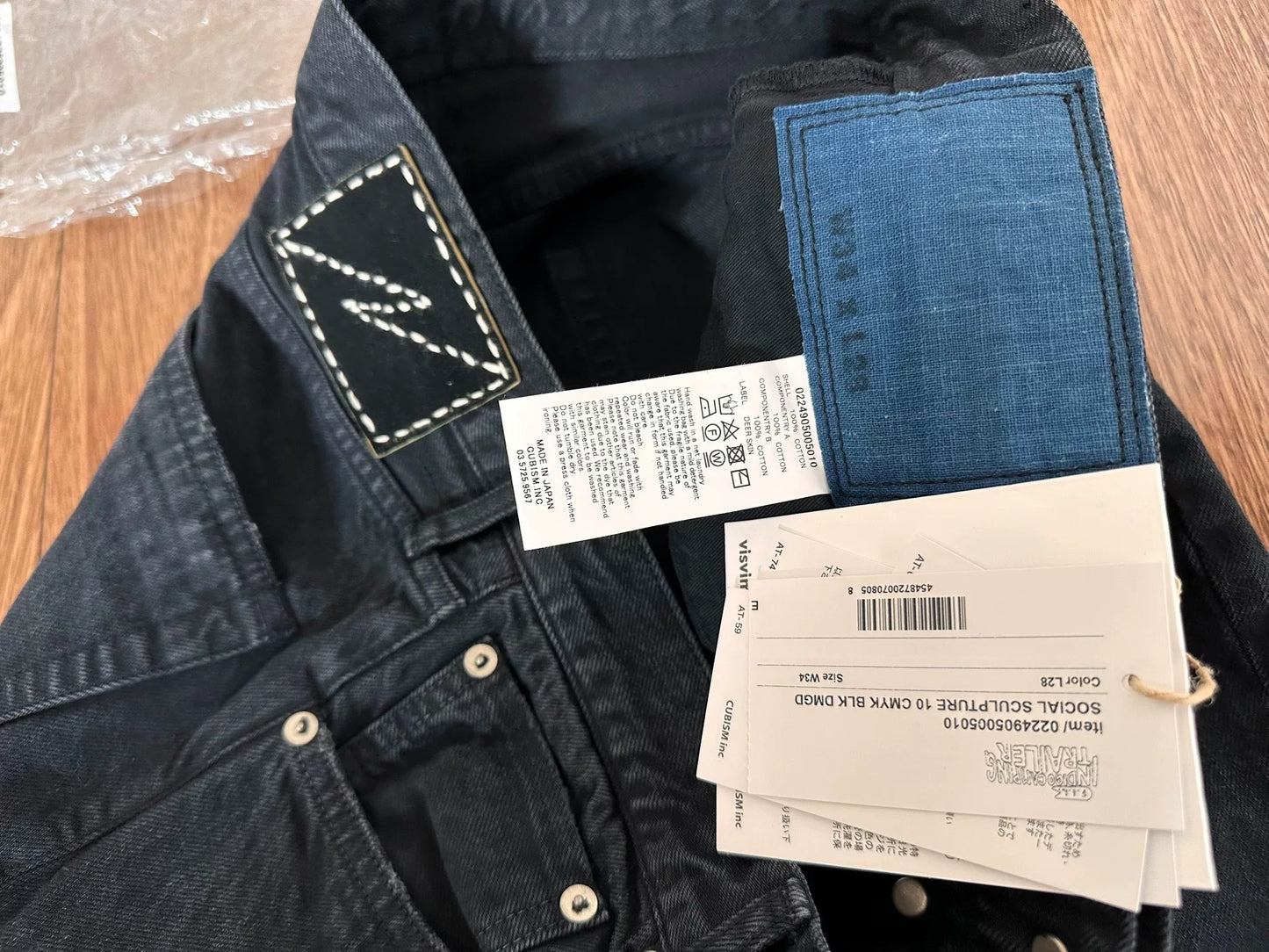 visvim cmky blk damaged jeans