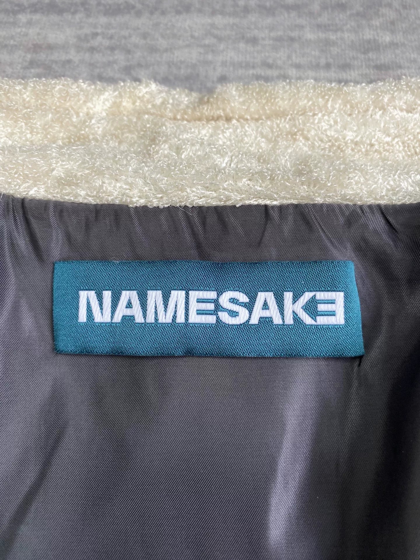 black and white fleece jacket with color blocking