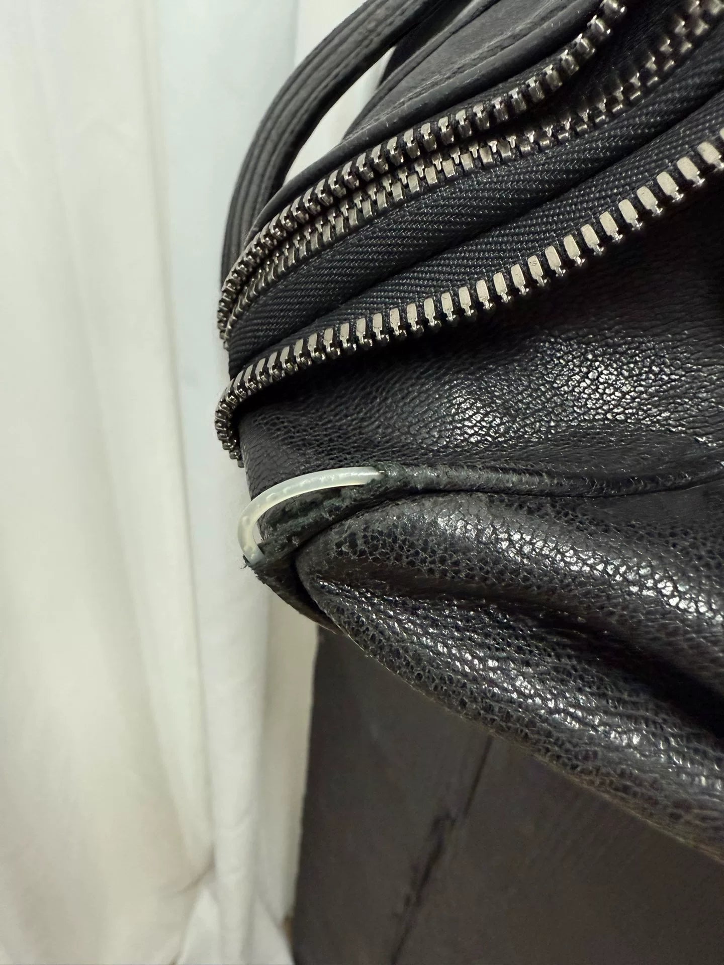 large black zippered handbag