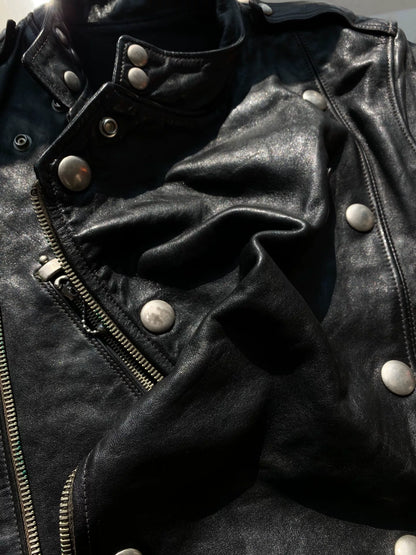 black leather biker jacket with detailed embellishments