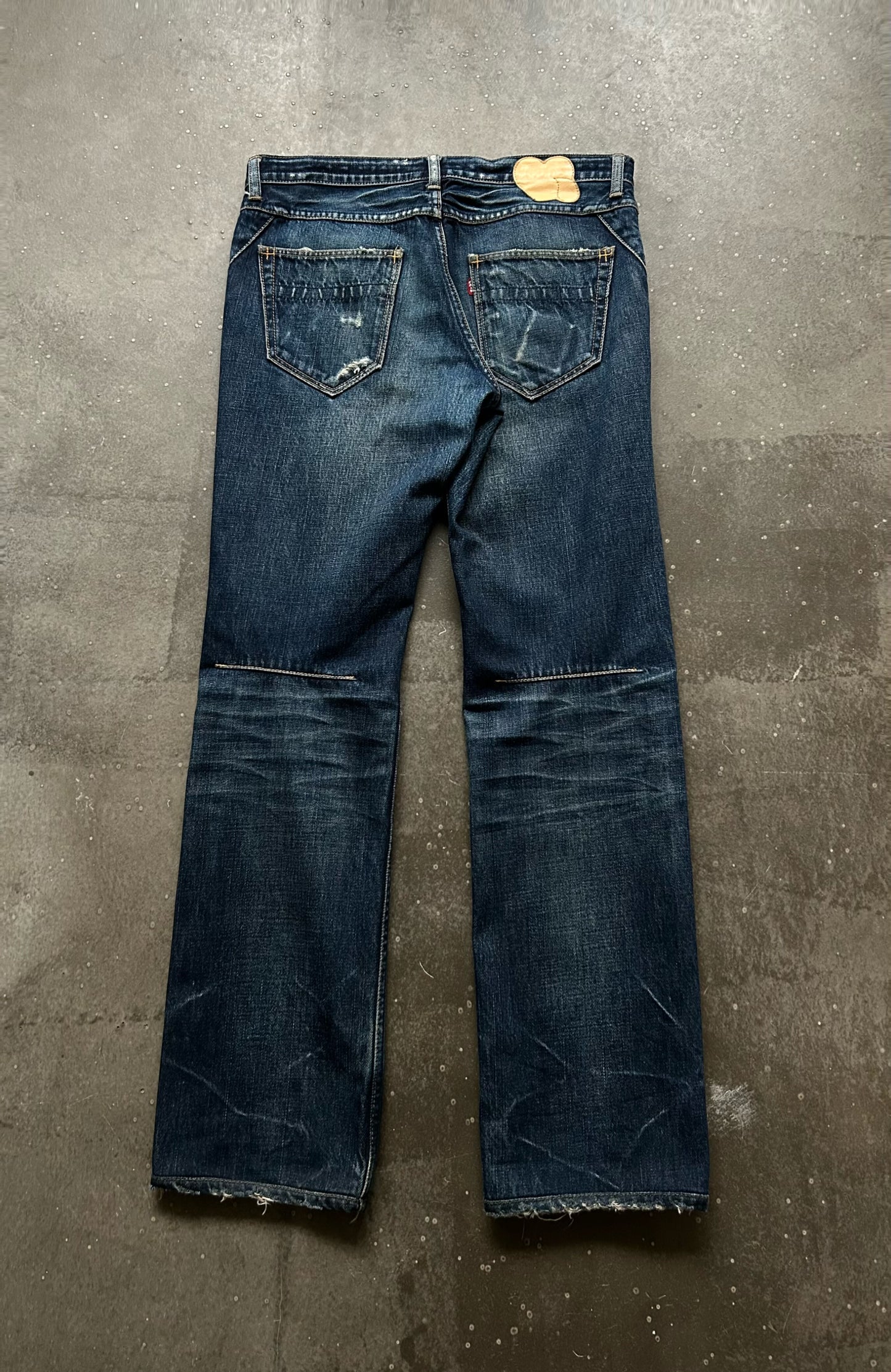 distressed washed denim pants by number nine