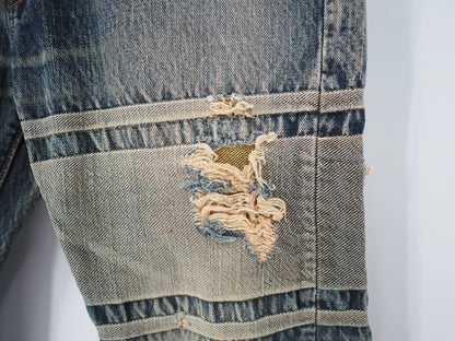 blue denim jeans with gold detail