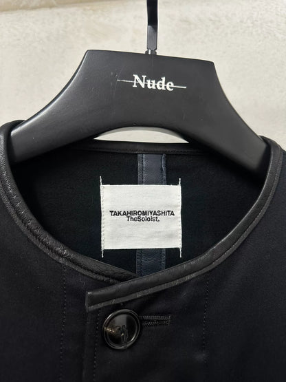 black oversized jacket with frayed hem