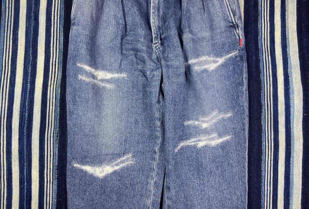 washed blue tapered denim pants for men