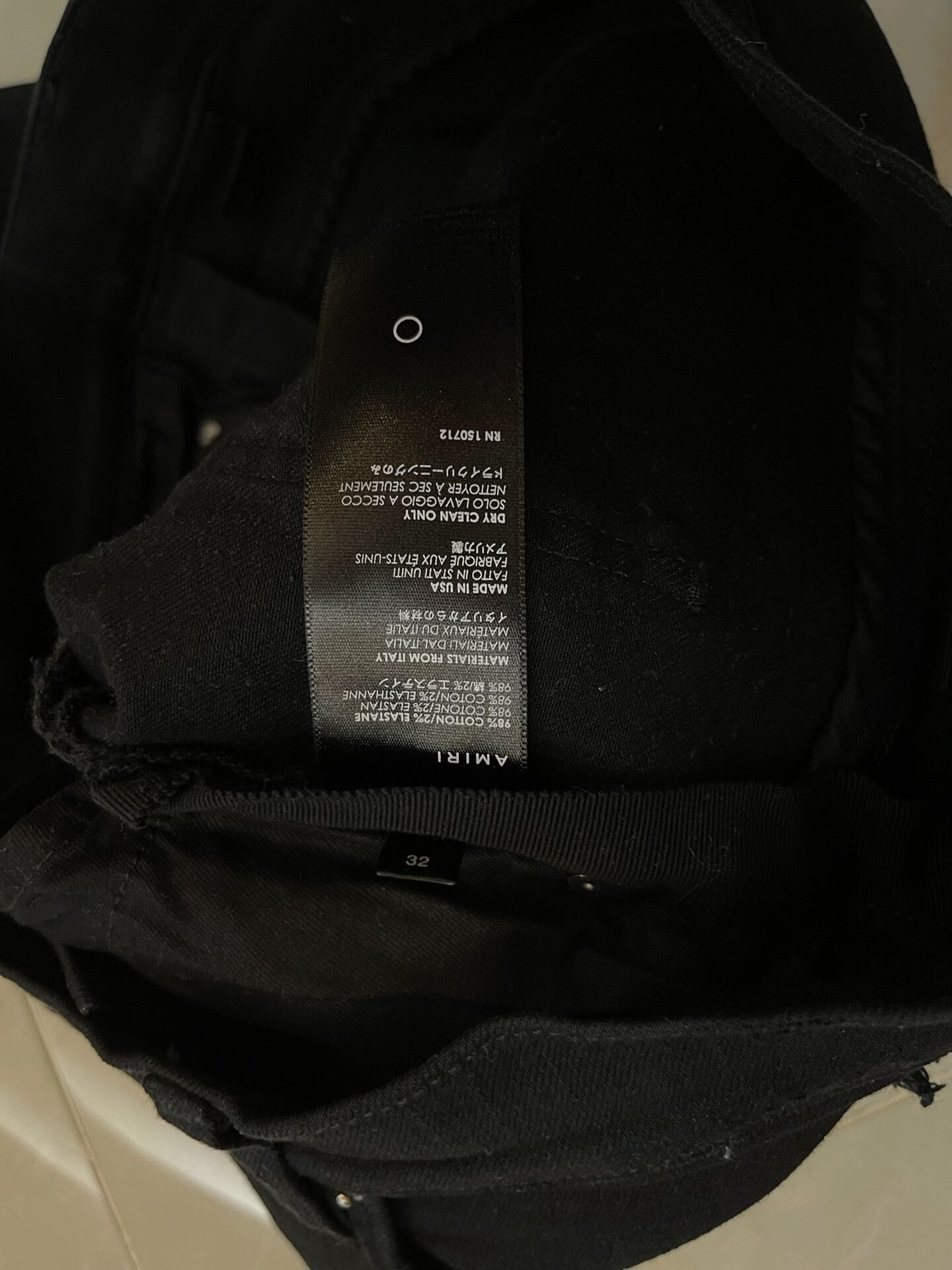 Amiri Black Denim Pants with Artistic Features