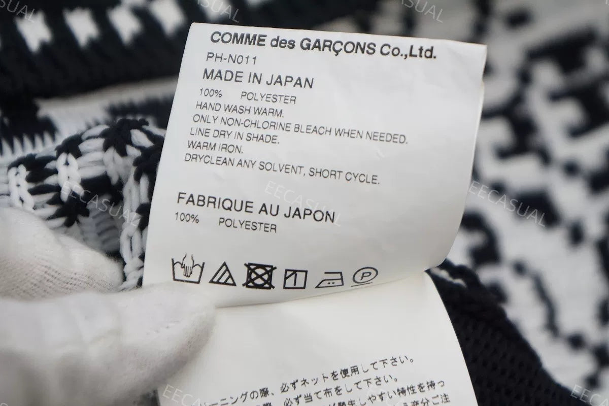 Asymmetrical Knit Vest by Comme des Garçons