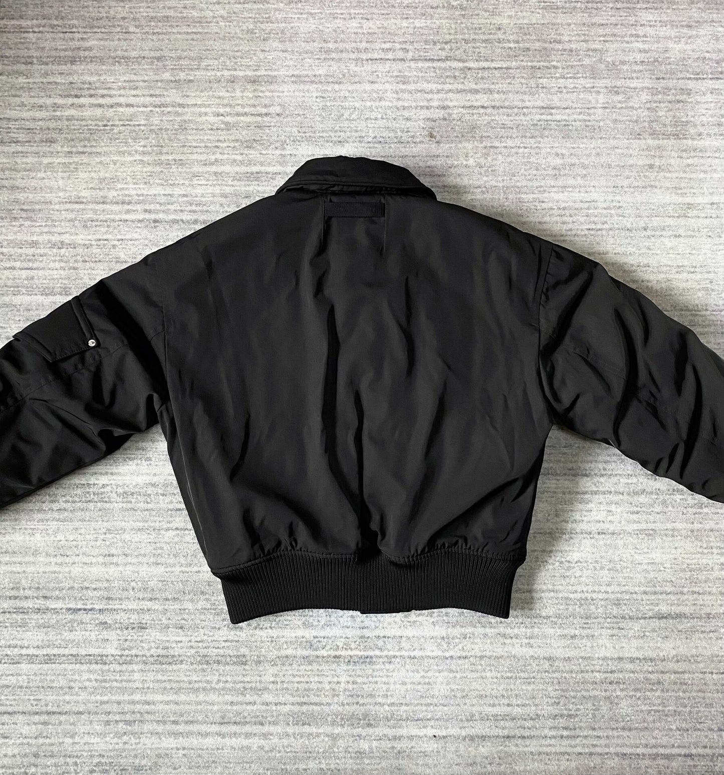 black bomber jacket with hidden pockets